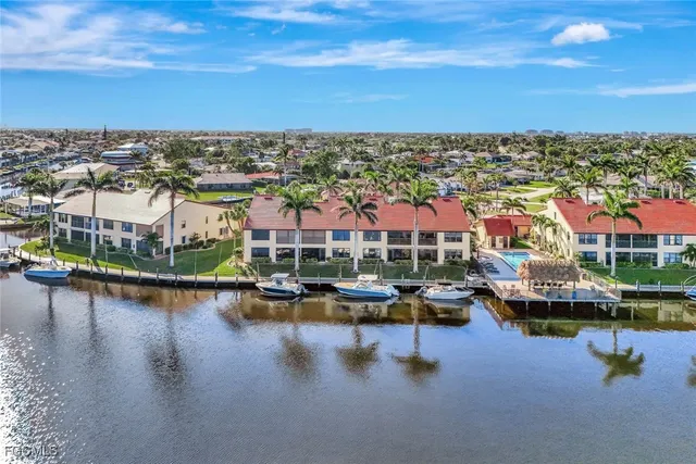 a view of a house with swimming pool