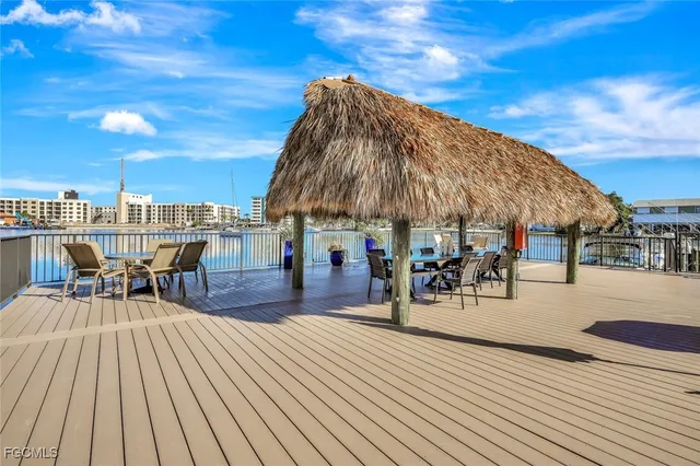 a view of a swimming pool with sitting area