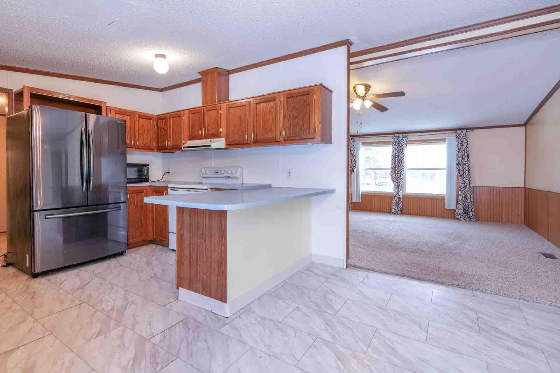 10380 17 Mile Road Rodney, MI 49342 - Photo 11 of 37 Kitchen / Family Room