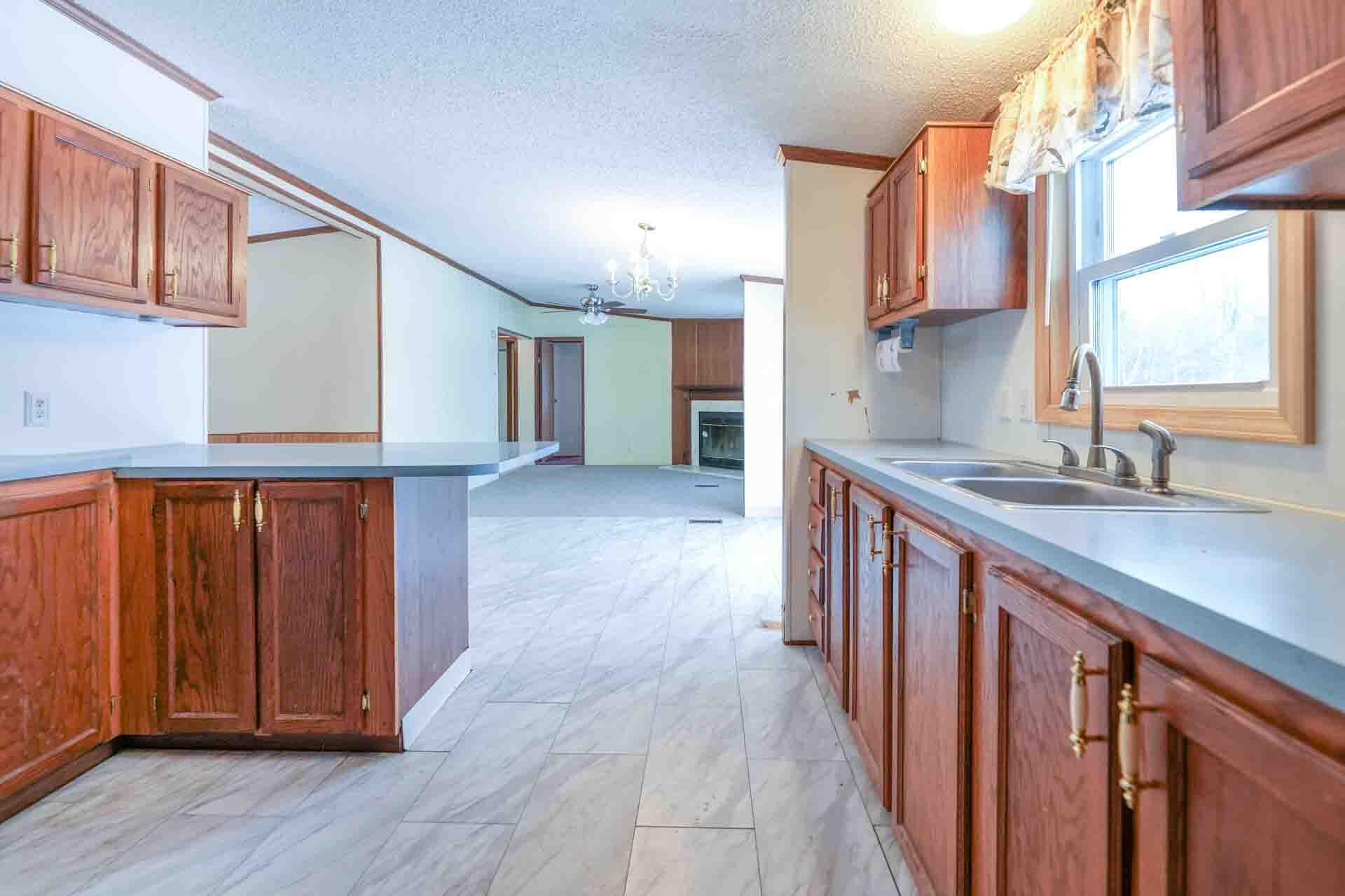 10380 17 Mile Road Rodney, MI 49342 - Photo 16 of 37 Kitchen to Living