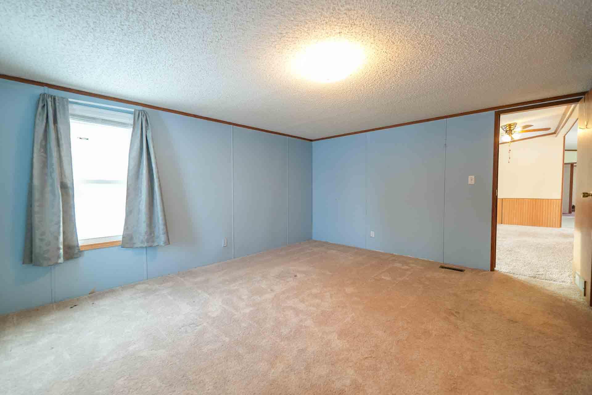 10380 17 Mile Road Rodney, MI 49342 - Photo 24 of 37 Primary Bedroom