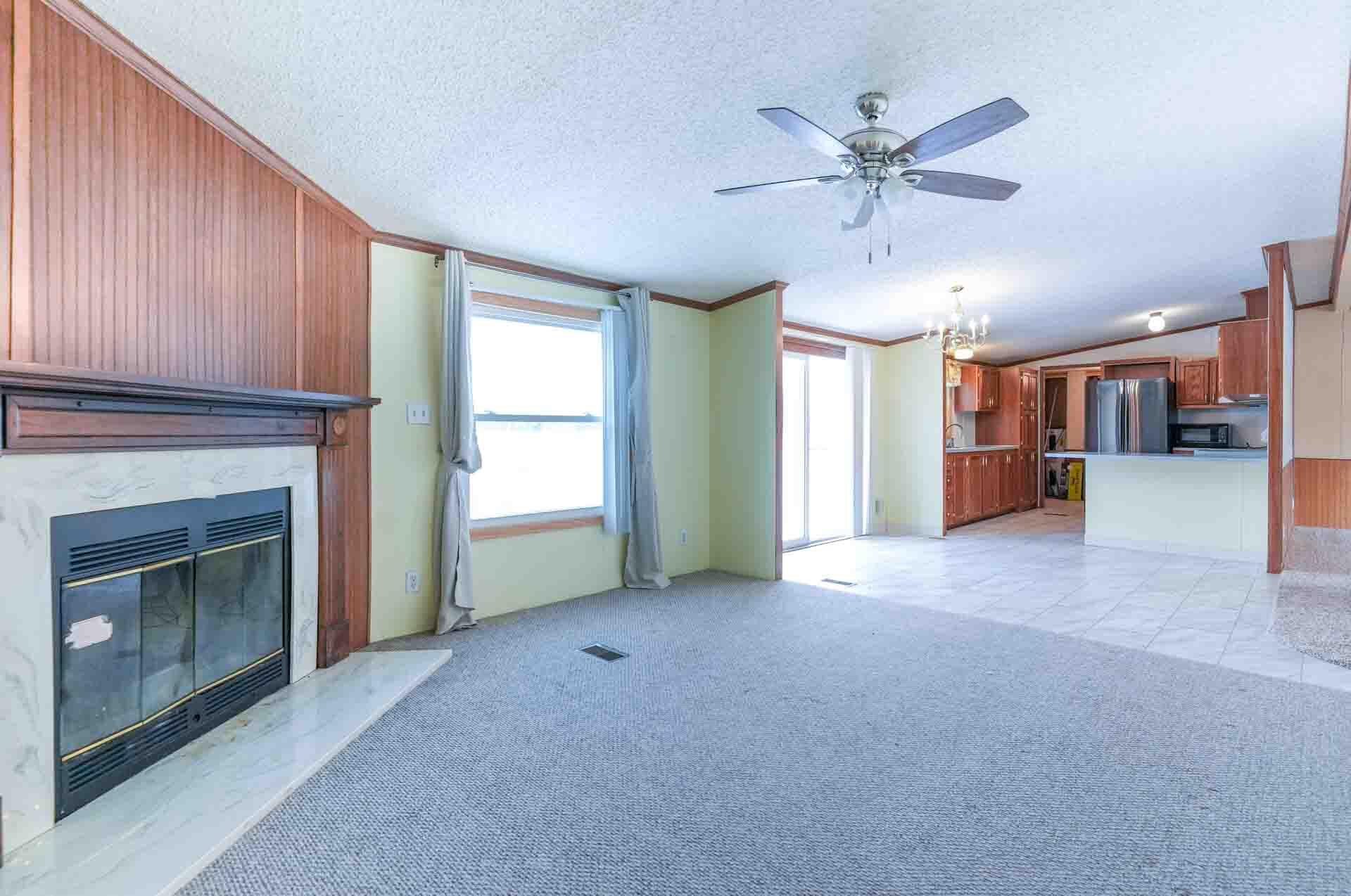 10380 17 Mile Road Rodney, MI 49342 - Photo 9 of 37 Living Room to Kitchen