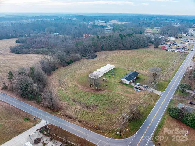 a view of a lake with a yard