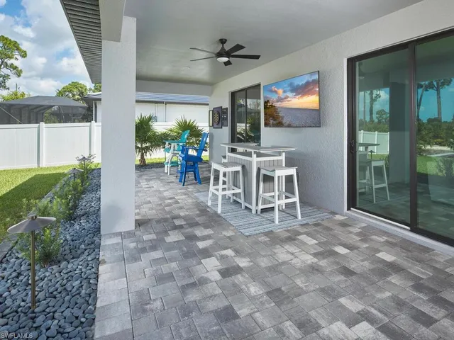 a view of a chairs and table in a livingroom