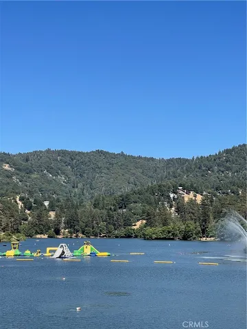 a view of a town with mountains in the background