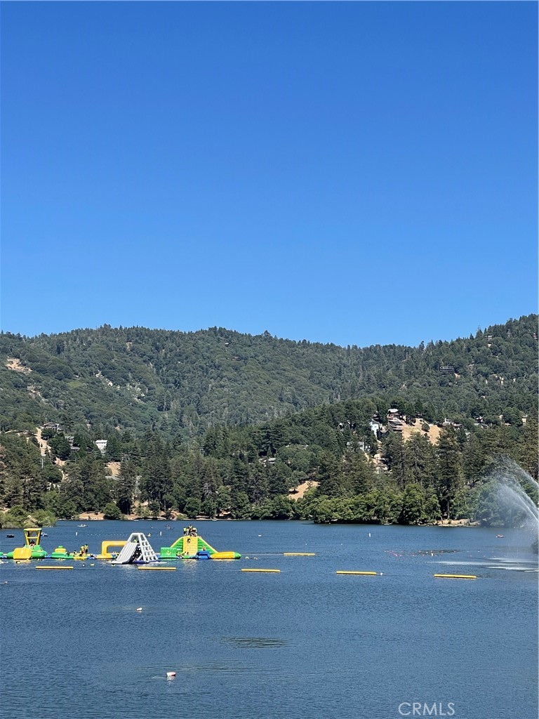 a view of a town with mountains in the background