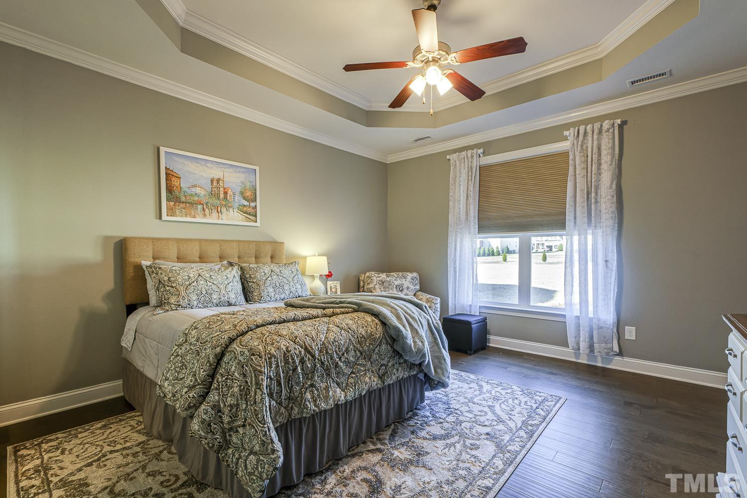 5516 Red Line Court Raleigh, NC 27603 - Photo 17 of 39 a bed room with a bed and a window