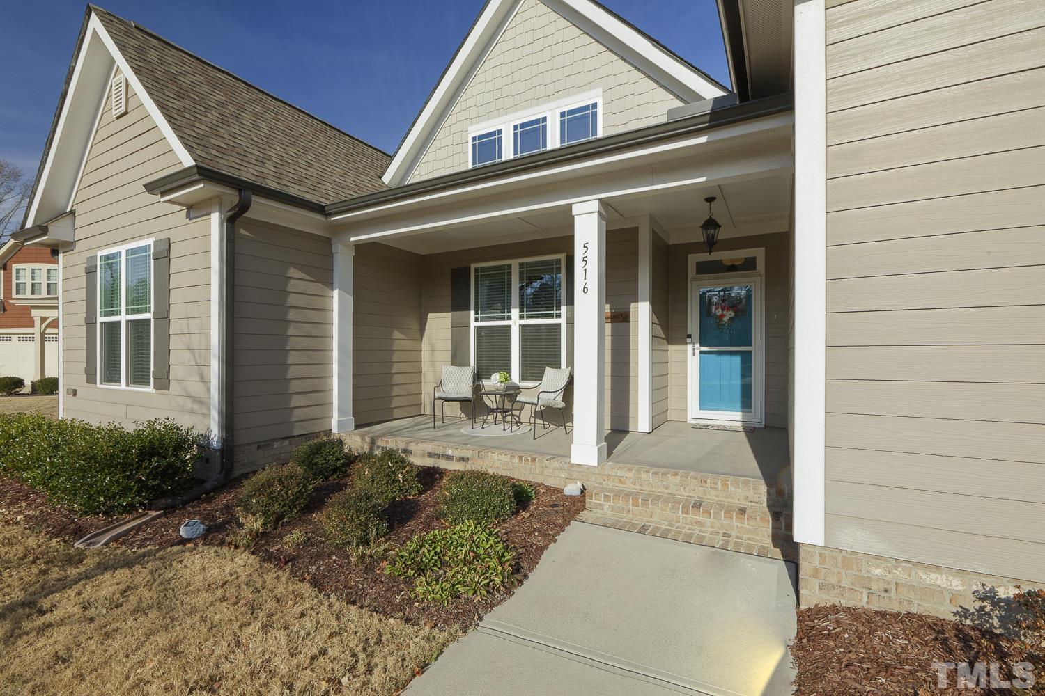5516 Red Line Court Raleigh, NC 27603 - Photo 2 of 39 a front view of a house with garden
