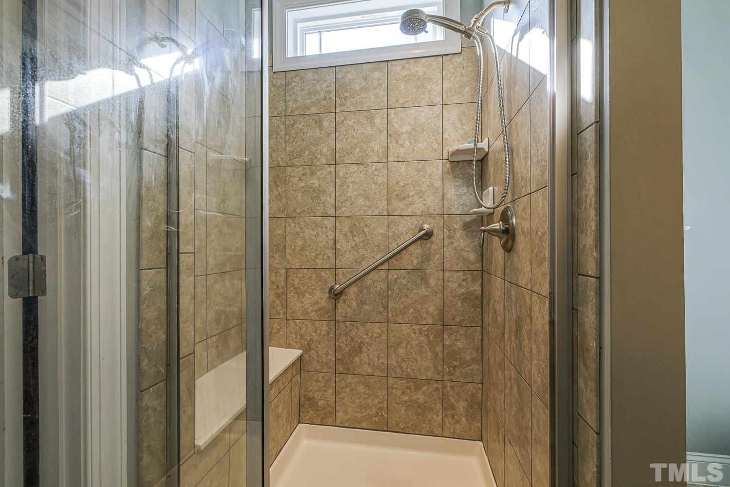 5516 Red Line Court Raleigh, NC 27603 - Photo 21 of 39 a bathroom with a shower