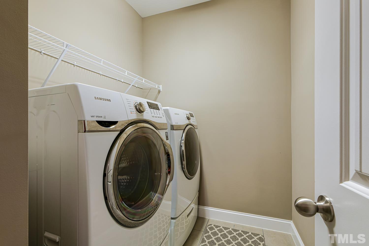 5516 Red Line Court Raleigh, NC 27603 - Photo 28 of 39 a utility room with dryer and washer