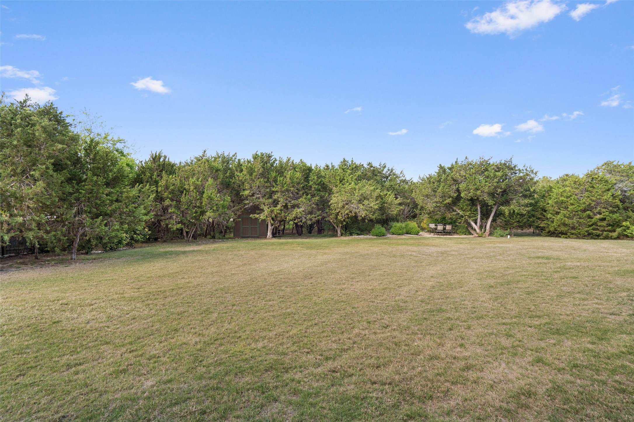 164 Milestone Road Liberty Hill, TX 78642 - Photo 32 of 40 The other side of the backyard, so much space for playing, pool, or just taking a stroll.