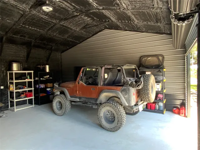 a bathroom with a toilet and shower