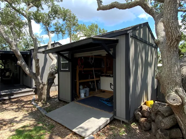 a view of a garden with a patio