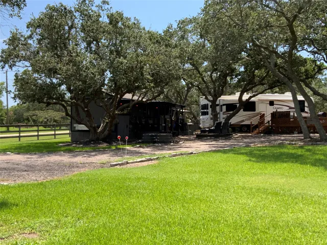 a view of a patio with a bench