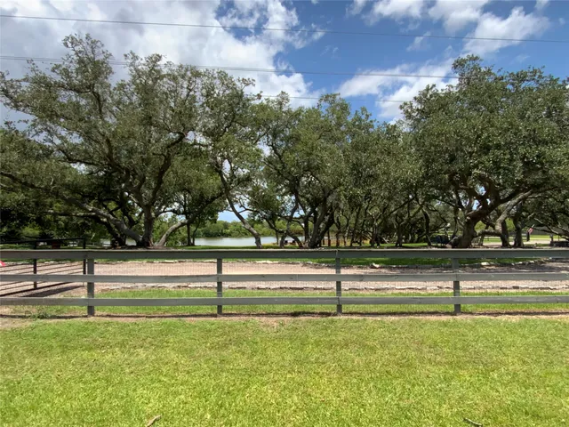a view of a lake with sitting area