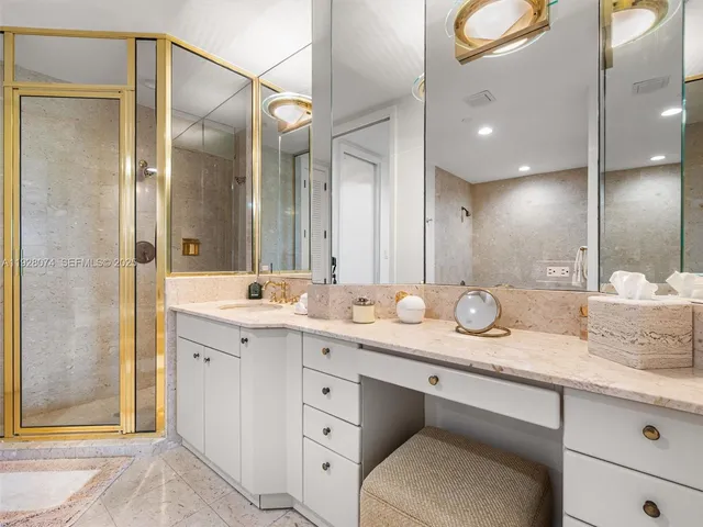 a spacious bathroom with a tub shower and sink