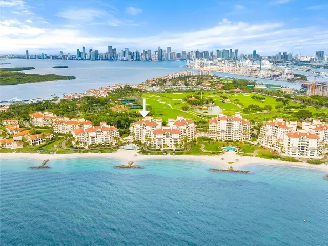 a view of a lake next to a building with a lake