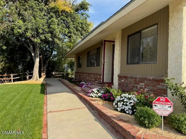 a view of a back yard of the house