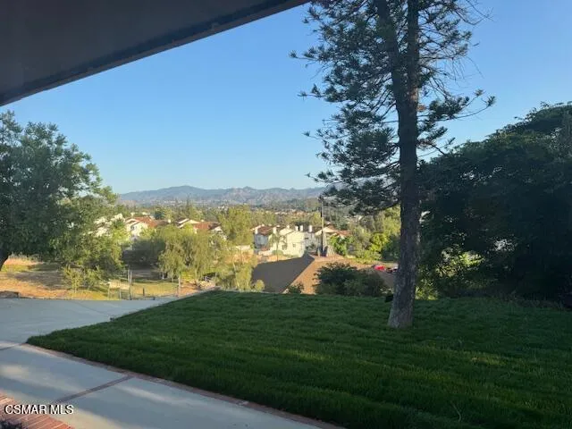 a view of a golf course with a lake view
