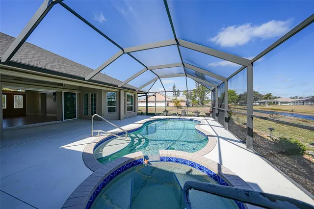 an aerial view of a house with outdoor space