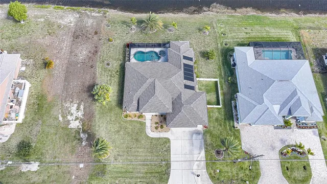 a view of a swimming pool with a patio