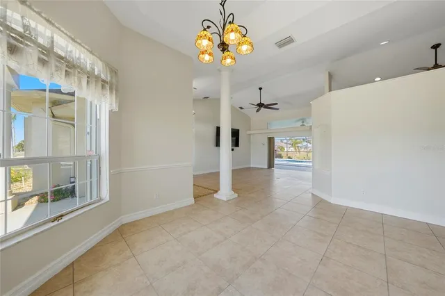 a view of an empty room and window