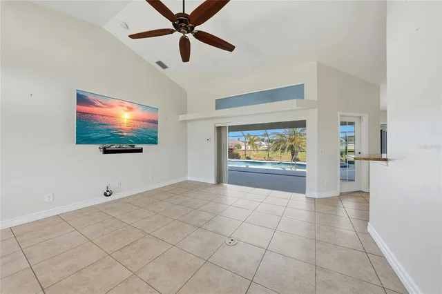 a view of an empty room with a flat screen tv