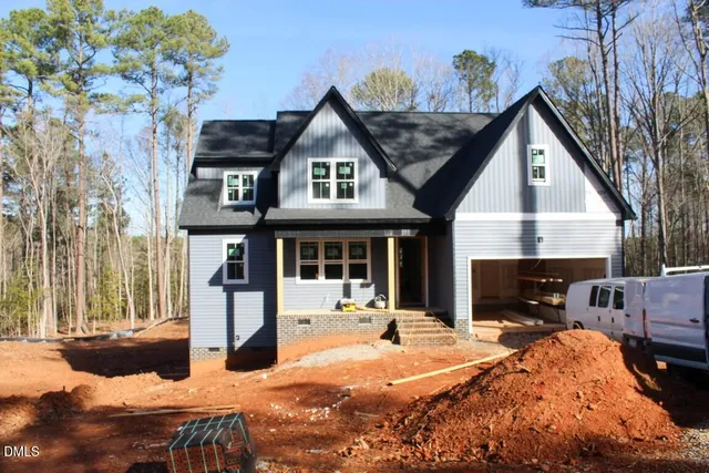 a view of a house with snow on the wall