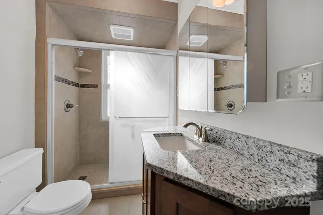 a view of a bathroom from the hallway