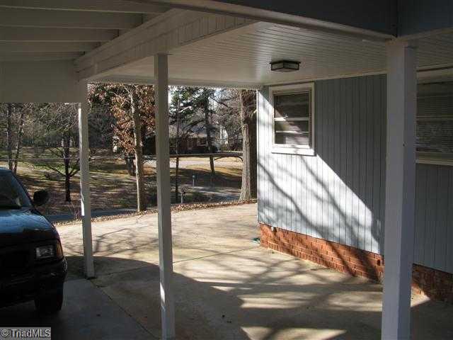 3428 Pine Valley Road High Point, NC 27265 - Photo 13 of 16 Exterior Front. Carport