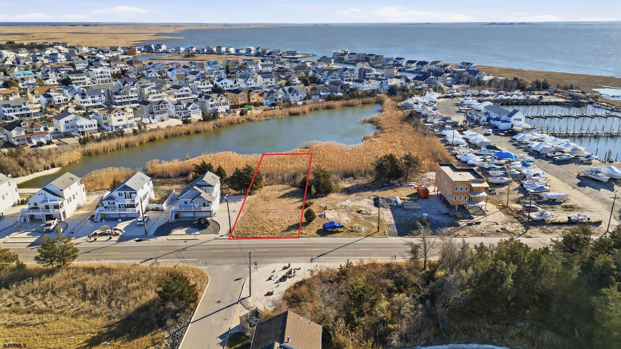 1417 Radio Road Little Egg Harbor, NJ 08087 - Photo 3 of 20 an aerial view of a house with a lake view