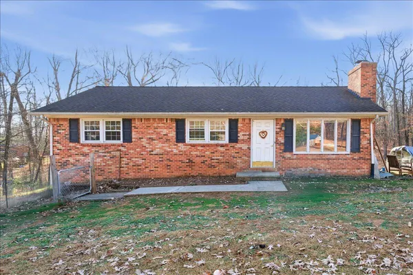 front view of house with a yard