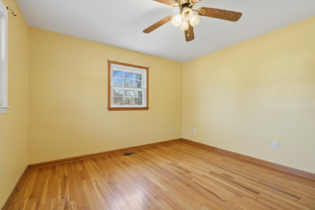2835 Edwardsville Road Hardy, VA 24101 - Photo 12 of 35 a view of empty room with wooden floor