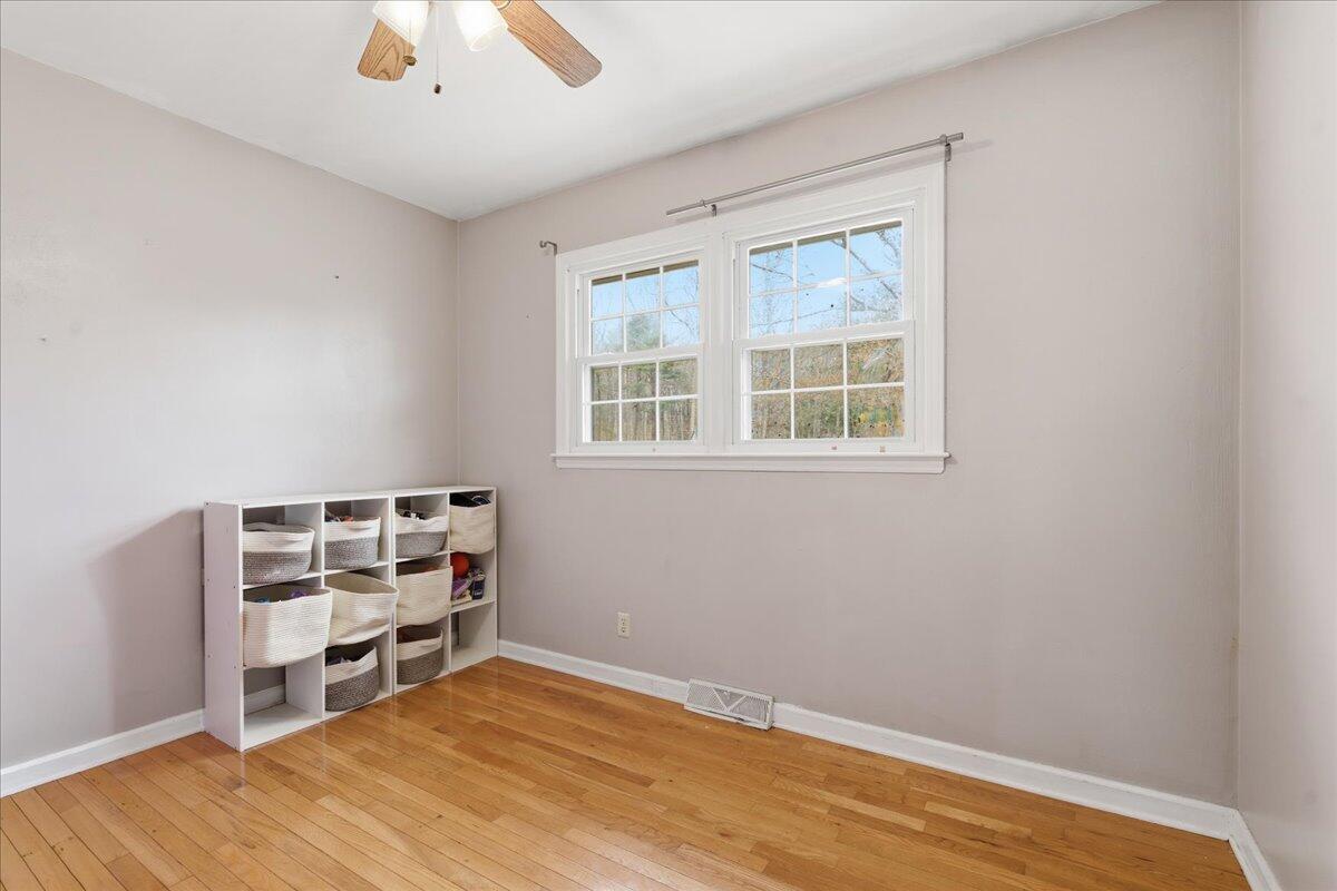 2835 Edwardsville Road Hardy, VA 24101 - Photo 14 of 35 an empty room with piano and a window