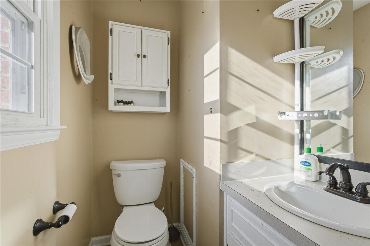 2835 Edwardsville Road Hardy, VA 24101 - Photo 18 of 35 a bathroom with a toilet a sink and a window