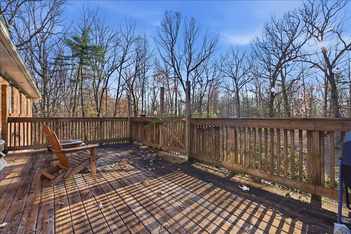 2835 Edwardsville Road Hardy, VA 24101 - Photo 27 of 35 a view of a roof with wooden fence and floor