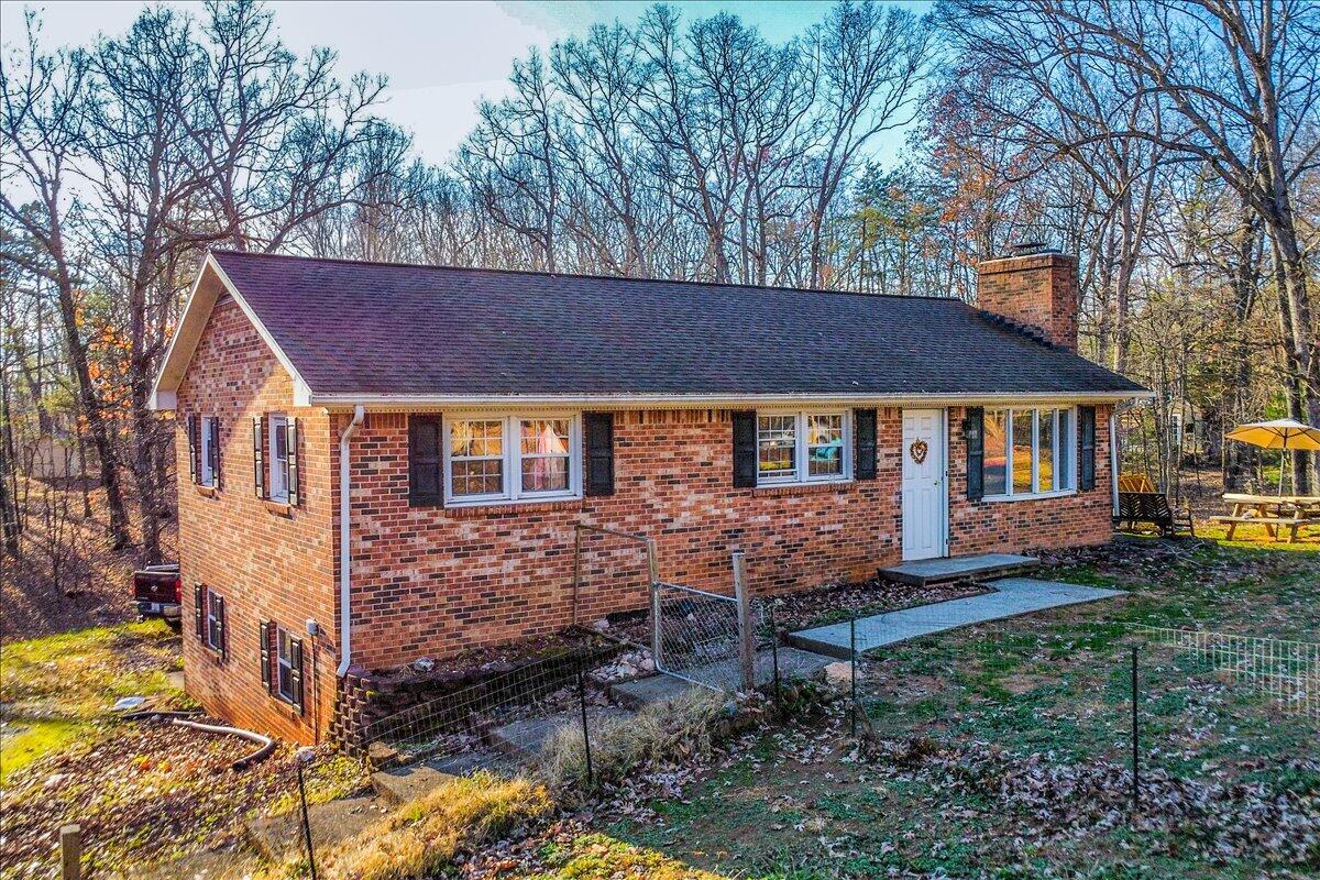 2835 Edwardsville Road Hardy, VA 24101 - Photo 32 of 35 a view of house with a yard