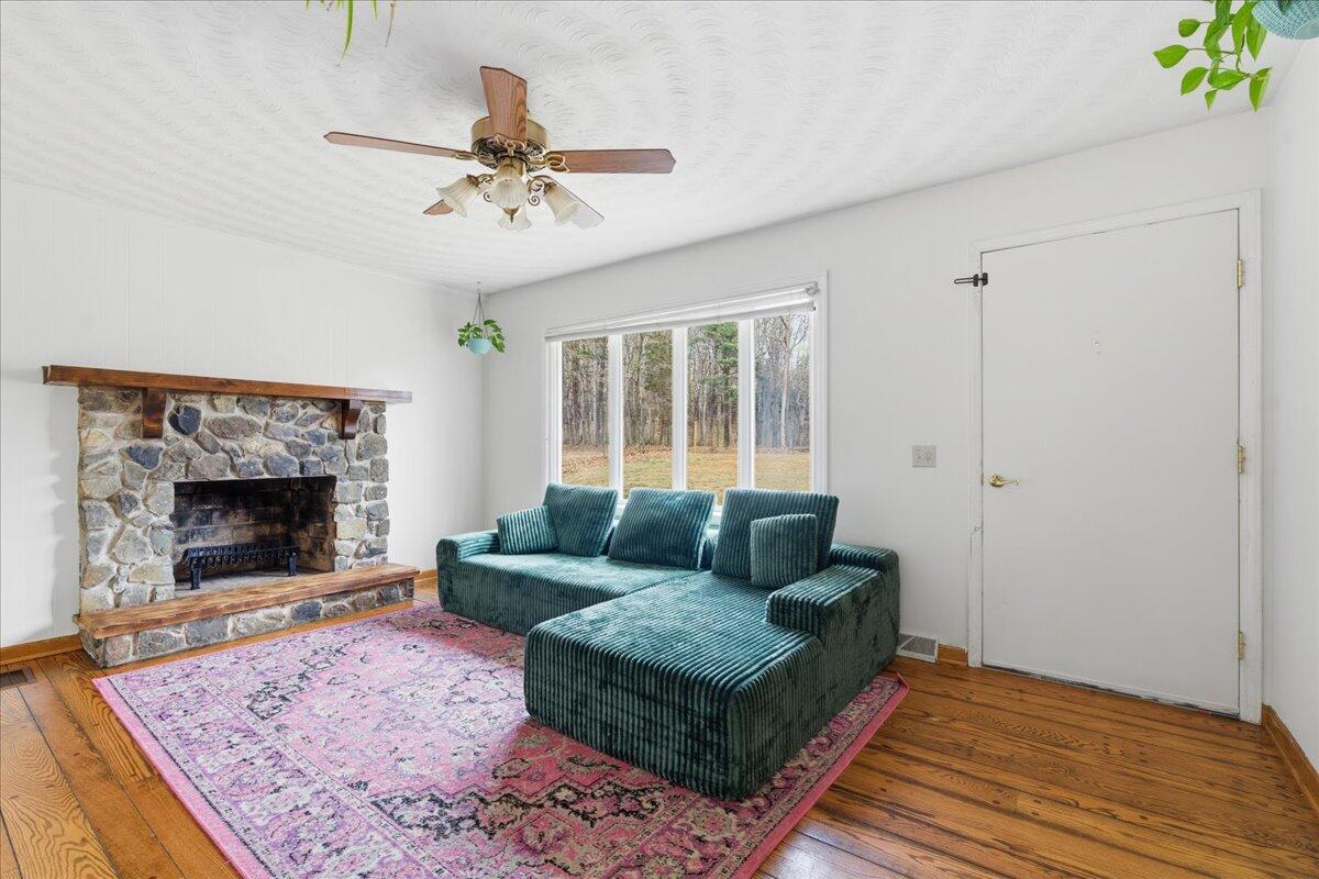 2835 Edwardsville Road Hardy, VA 24101 - Photo 6 of 35 a living room with furniture and a fireplace
