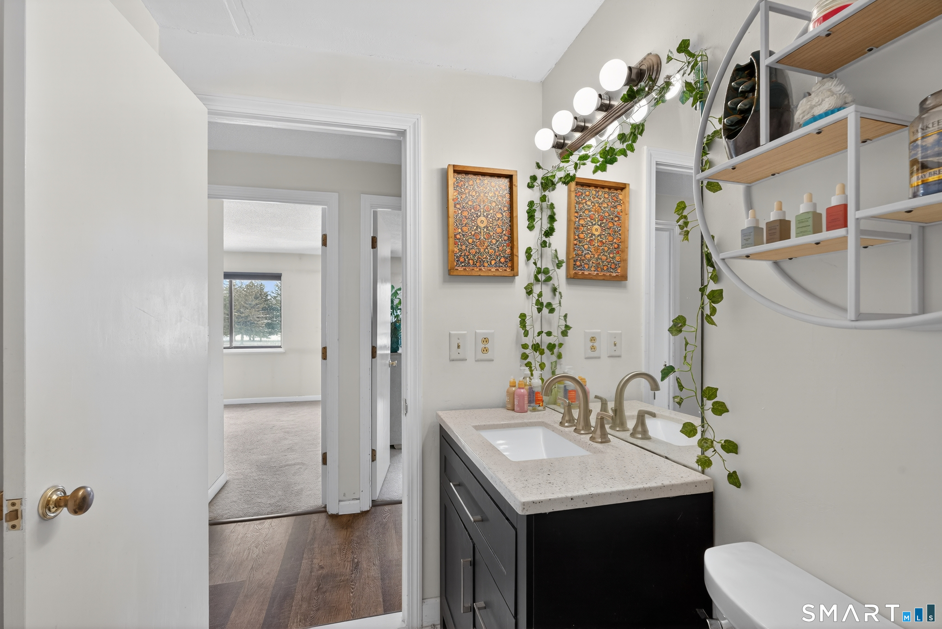 21 Putter Drive, Unit 303S Wallingford, CT 06492 - Photo 7 of 30 a bathroom with a sink toilet and shower