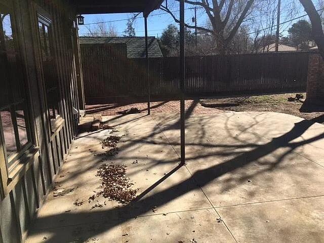 2915 21st Street Lubbock, TX 79410 - Photo 6 of 18 a view of a backyard of the house