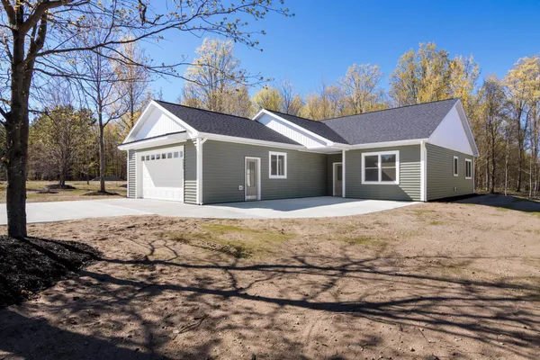$479,900 | 6533 Jeffrey Place, Grawn, MI 49637