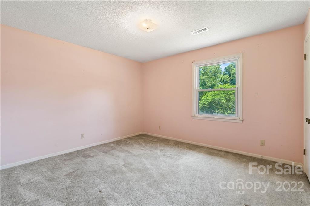 312 Brookside Drive Fort Mill, SC 29715 - Photo 16 of 23 an empty room with a window