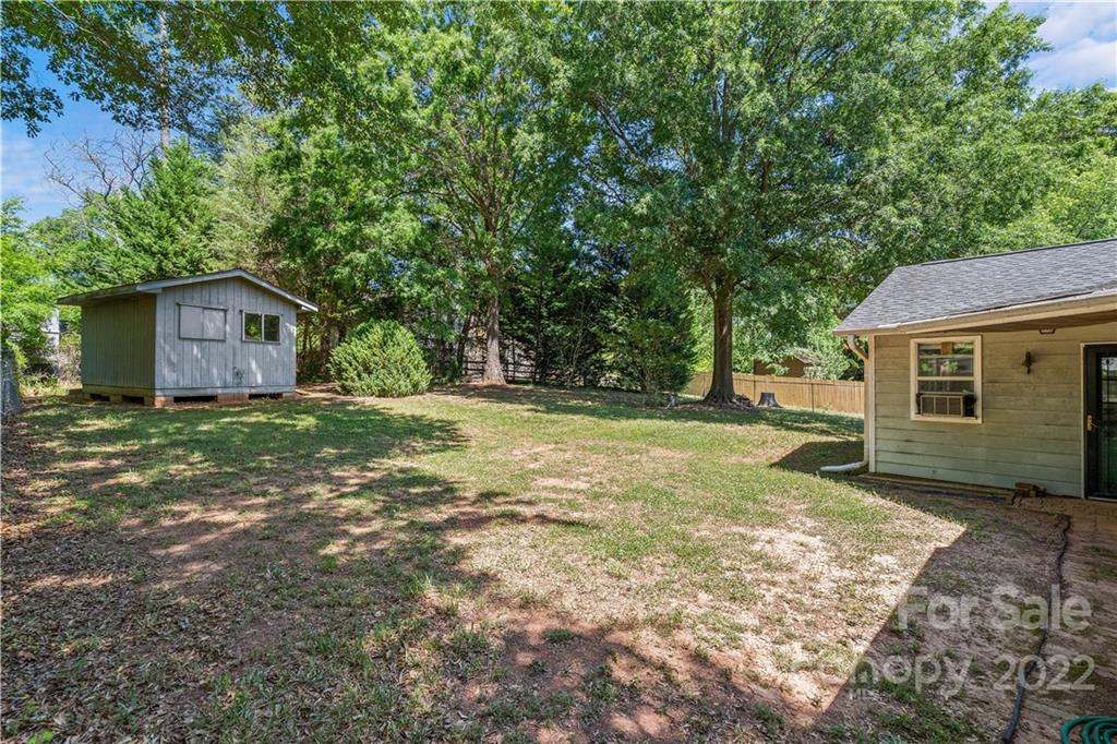 312 Brookside Drive Fort Mill, SC 29715 - Photo 22 of 23 a view of a house with a yard