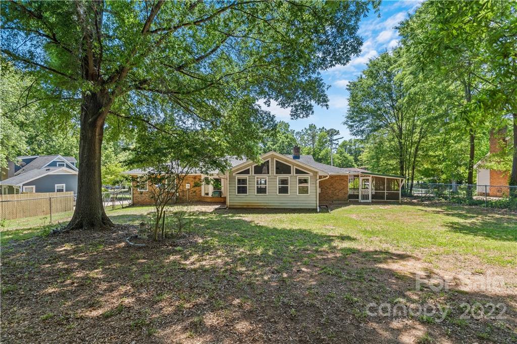 312 Brookside Drive Fort Mill, SC 29715 - Photo 4 of 23 a white house that has a tree in front of it