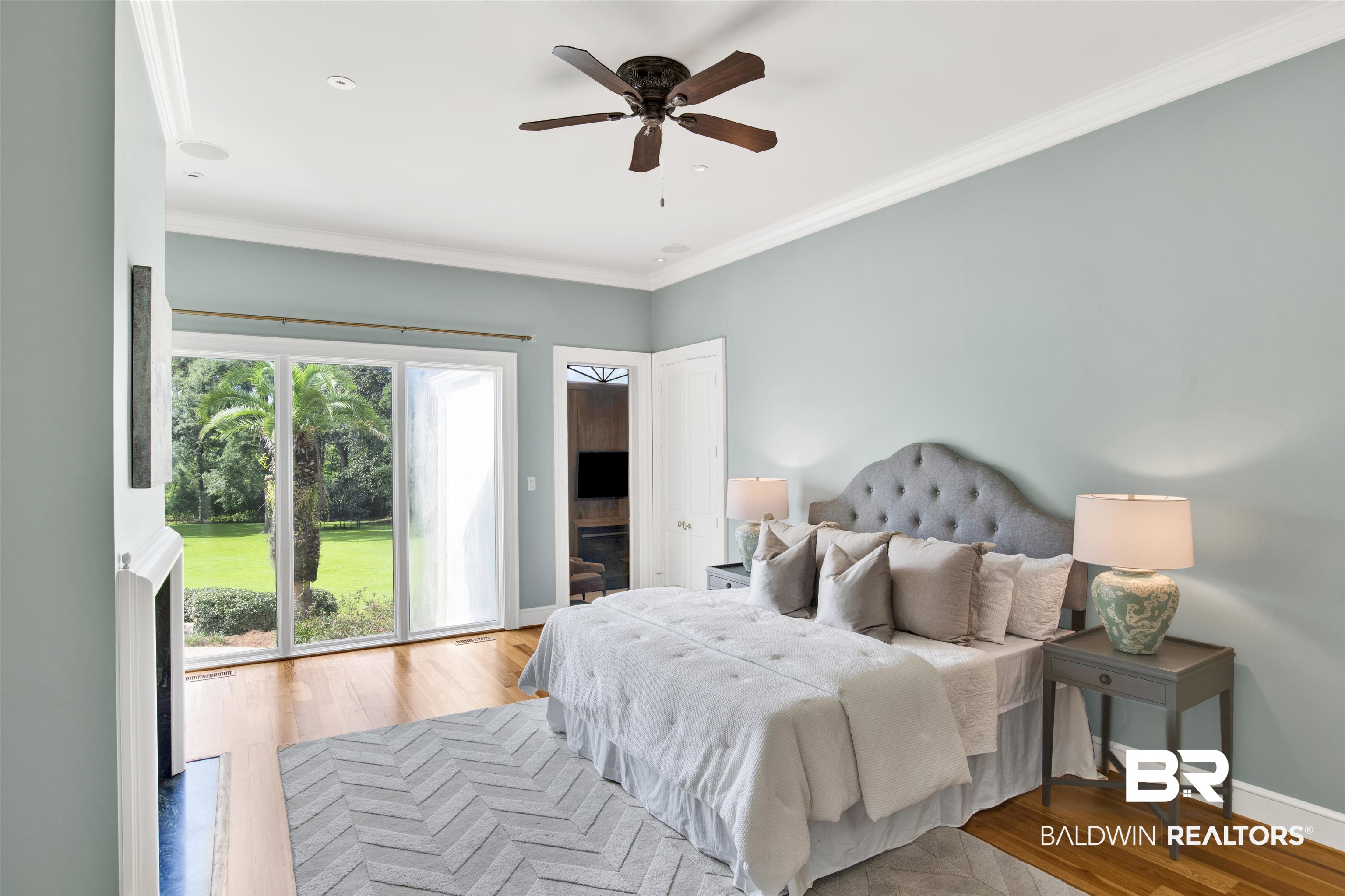 3816 Austill Lane Mobile, AL 36608 - Photo 29 of 80 Bedroom with ornamental molding, wood finished floors, access to exterior, recessed lighting, and ceiling fan