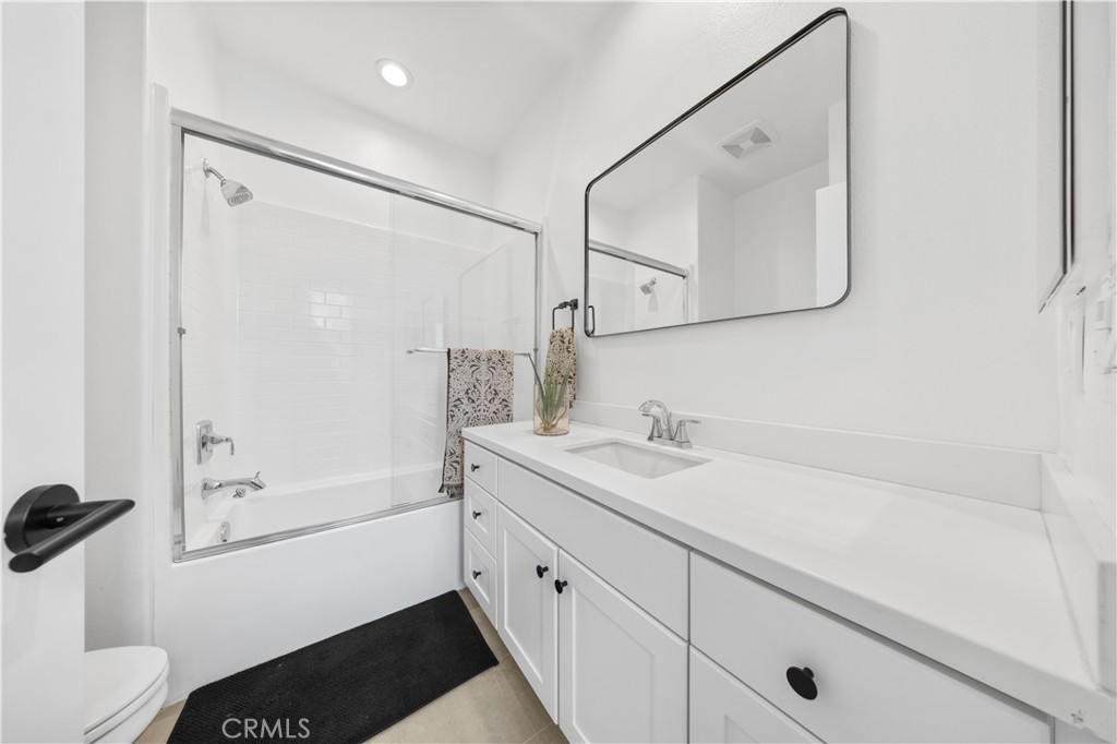 89 Kestrel Irvine, CA 92618 - Photo 21 of 36 a bathroom with a sink a toilet and shower