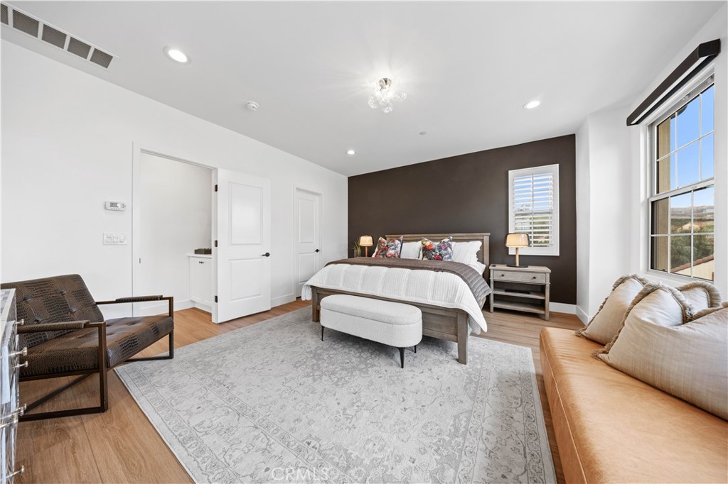 89 Kestrel Irvine, CA 92618 - Photo 23 of 36 a bedroom with bed and window