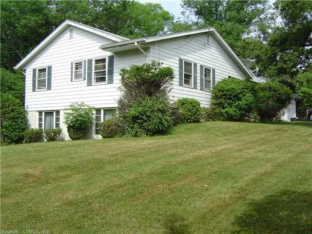 735 Old Hartford Road Colchester, CT 06415 - Photo 1 of 1 Facade/Exterior Front. Full windows on side would allow you to finish large lower level.
