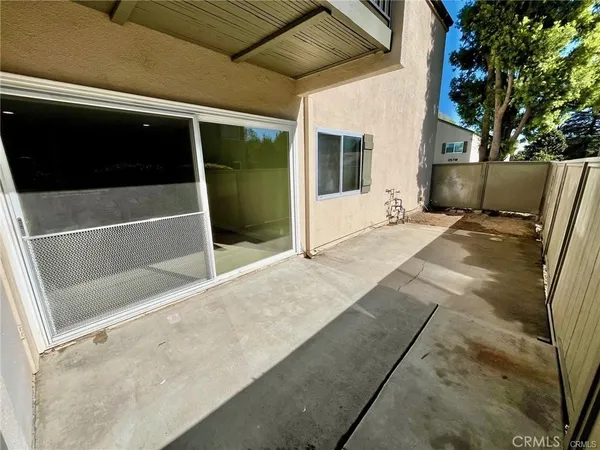 a view of backyard with tub
