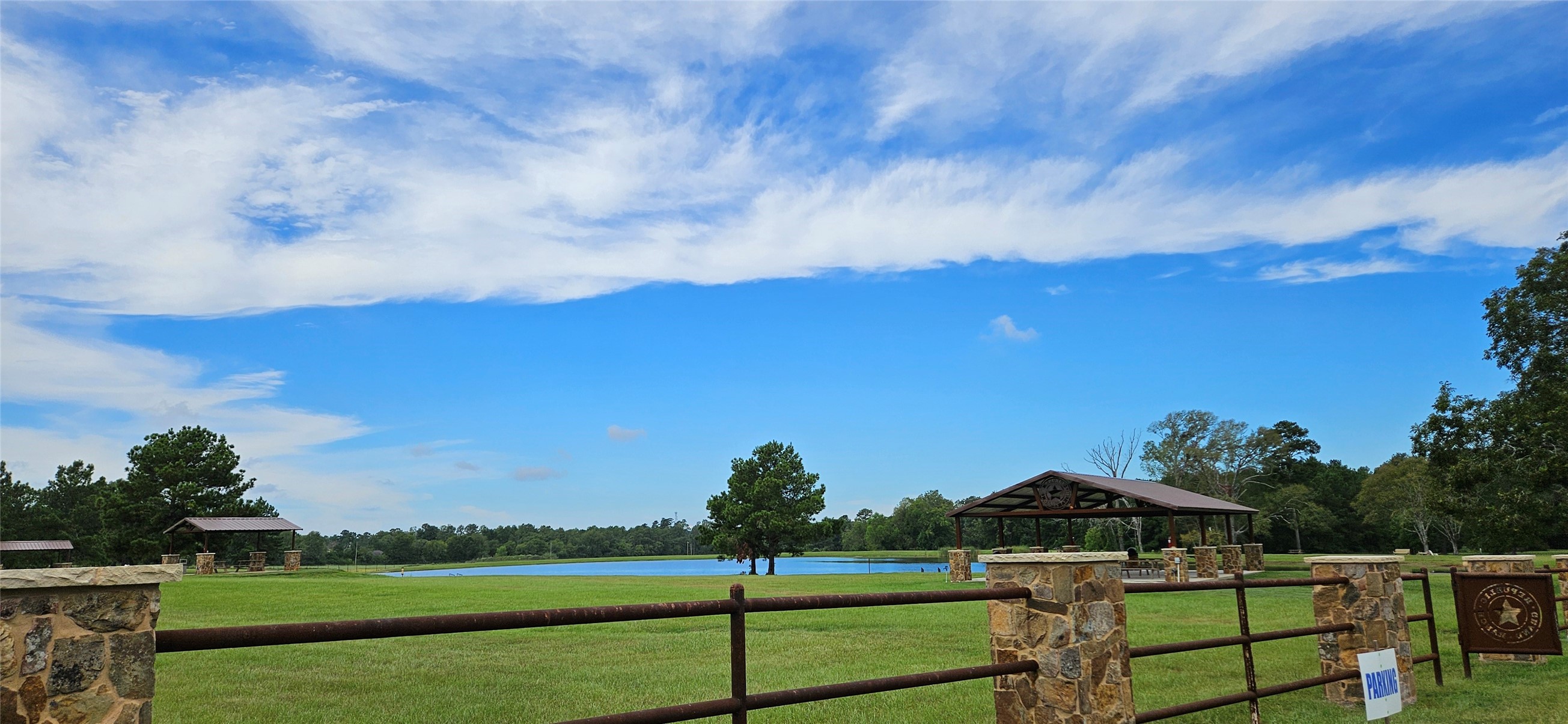 16029 Ridge Oak Road Willis, TX 77378 - Photo 4 of 10 a view of a field with sitting area